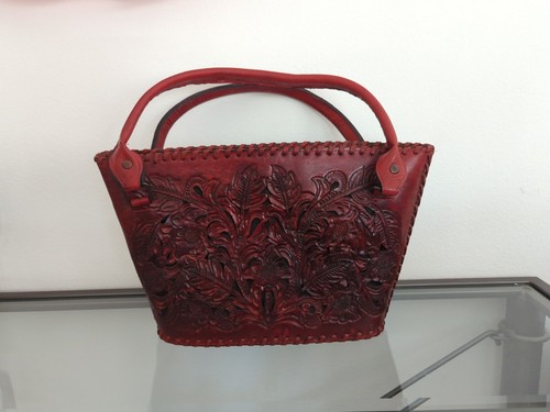 Red hand tooled leather floral - hand,