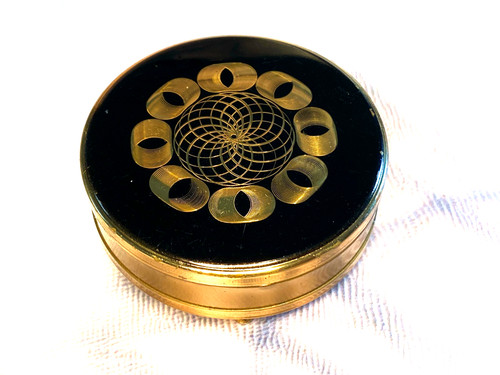 Black and gold footed margaret - and,
