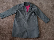 EVANS  COAT BLACK NEW SIZE 24..WATERPROOF.