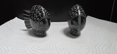 Black stone carved fish - stone,