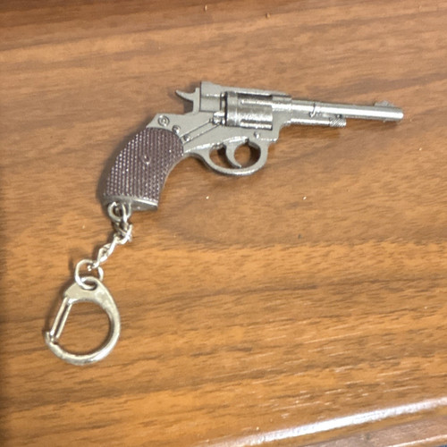 Silver tone revolver - revolver, gun