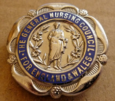 VINTAGE ENAMEL BADGE GENERAL