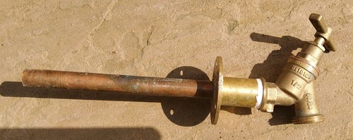 Outside tap faucet with - outside, wall