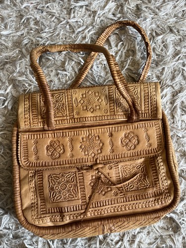 Hand tooled leather shoulder - hand,