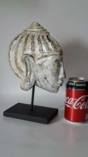 Stone buddha head on stand - head,