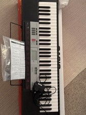 Casio CTK-1200 Electronic Keyboard 61-Key with Power Supply