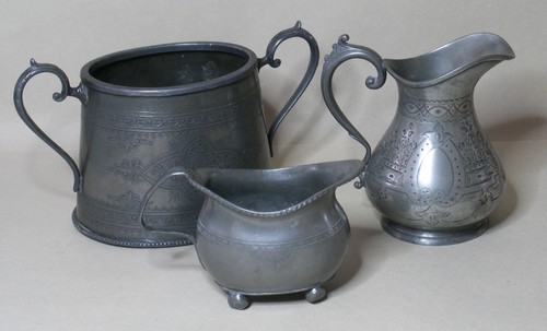 Three antique pewter items - three,