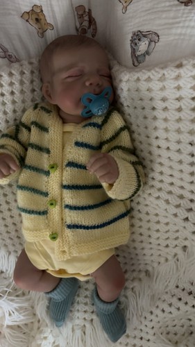 Weighted reborn baby doll - ,