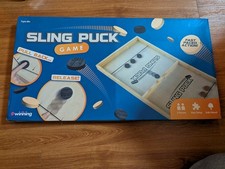 Wooden Sling Puck Game by