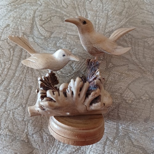 Hand carved wooden bird nest - hand,