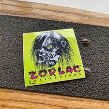 Zorlac Shrunken Head Yellow Skateboard Sticker - 1980s