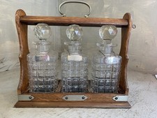 Antique Oak 3 Bottle Tantalus Decanter Set