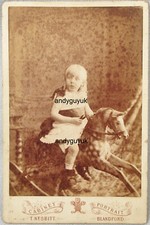 CABINET CARD GIRL ROCKING