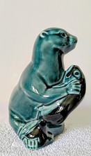 Poole Pottery otter with fish immaculate condition 12cm height