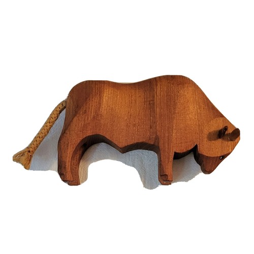 Hand carved wood bull bison - hand,