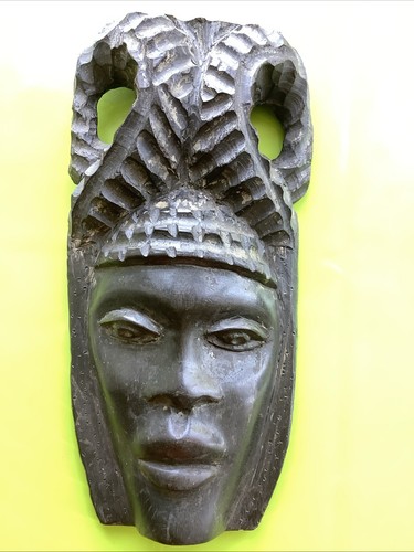 Tribal occult carved wooden - carved,