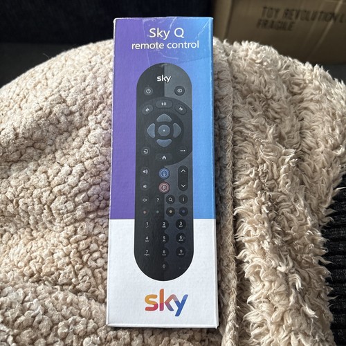 Sky remote with - q,