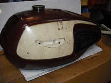 vintage Triumph petrol tank dented with cap & knee pads