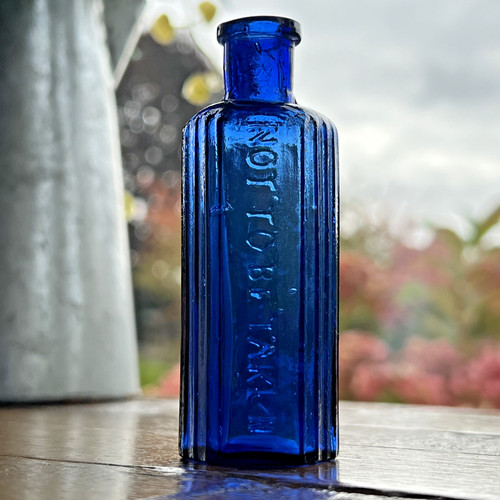 Blue vintage glass not to - oz,