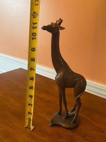 Giraffe inches statue - giraffe,