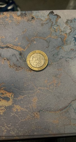 Rare pound coin with minting - with,