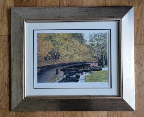 Signed framed canal print