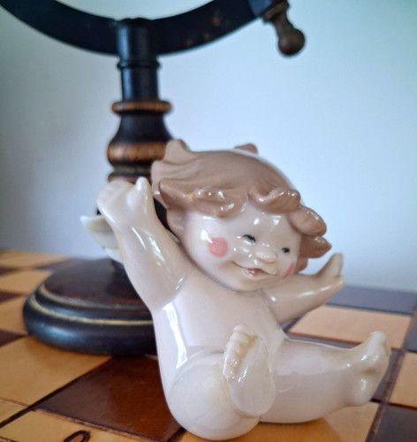 Nao lladro cheeky cherub - cheeky,