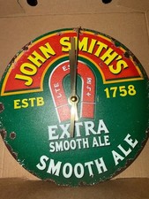 John smiths metal wall Clock