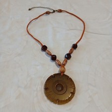 Vintage Boho Carved Stone Necklace Featuring A Floating Middle Stone on Leather.