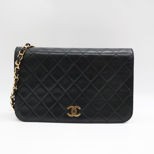 Chanel black push lock - cc,