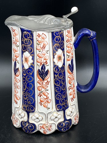 Antique ceramic jug with - antique,