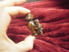 Carved wood netsuke boy