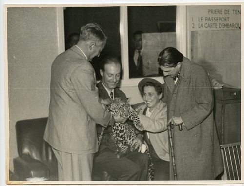People with leopard photo - with,