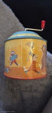 Moulin Roty Winding Musical Box with a circus or brass band theme.