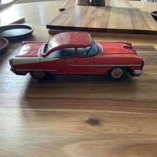 Vintage looks to be Nomura tin, friction drive 1958 Oldsmobile