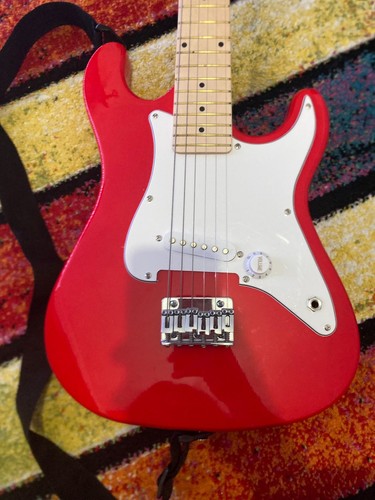 Electric guitar with - 3/4, strap