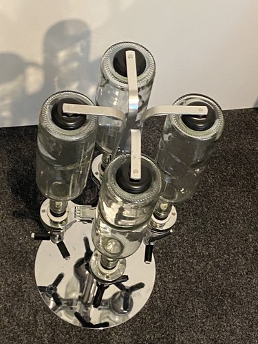 Bottle revolving optic stand - bottle,