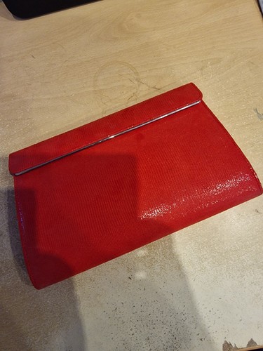 Ladies clutch bag with - , chain