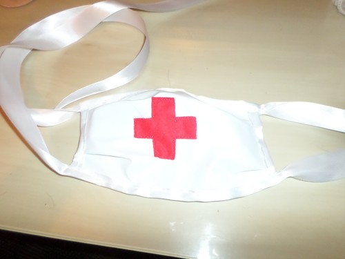 White pvc mask - red, cross