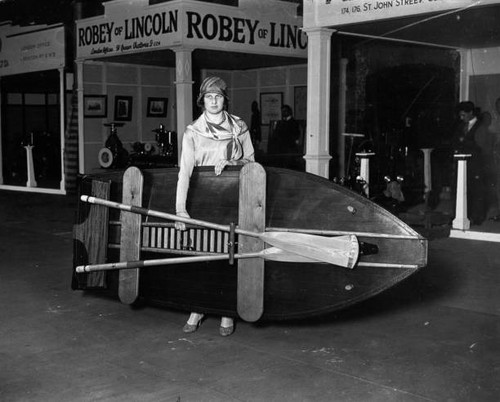 Woman carrying stowaway - carrying, 'stowaway'