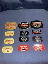 12 Taunton Cider Unused Pump Clips/Signage, 11 Plastic, 1 Metal.