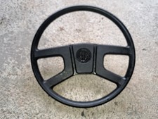 A FINE MG OR MGB ROADSTER 15" STEERING WHEEEL WITH CENTER CAP