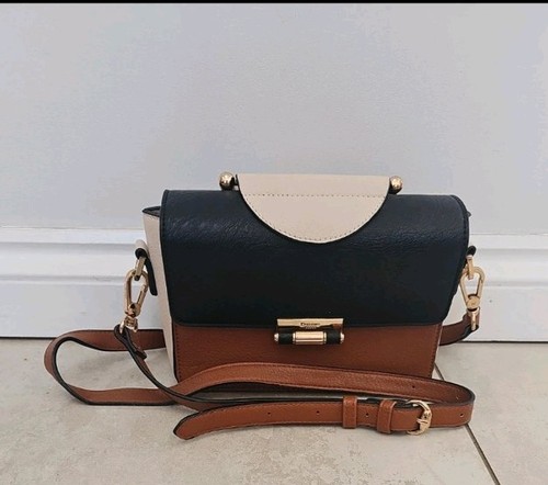 Dune tan and black shoulder - and,