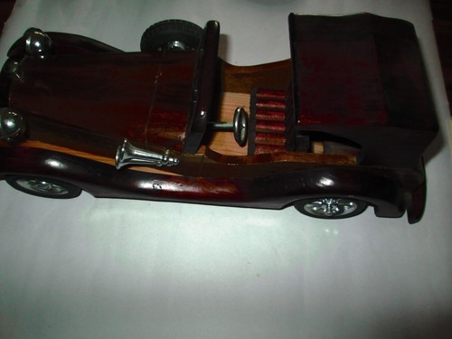 Hand made wooden model car - hand,