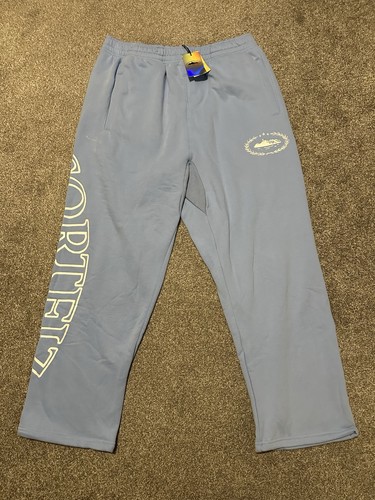Blue and white corteiz joggers - and,