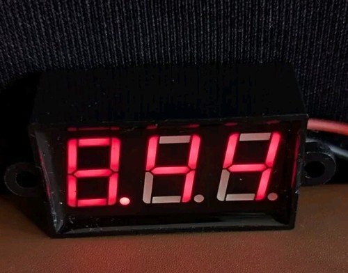 Pair digital voltmeter red - of,