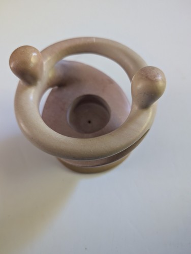 Carved stone candle holder - carved,