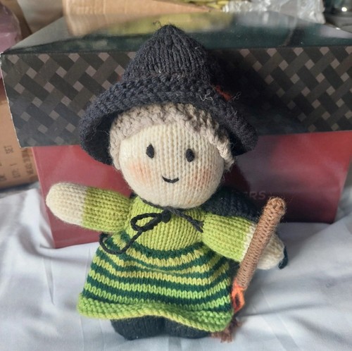 Hand knitted halloween witch - hand,