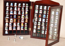 Thimbles - 90 in total, 3 of them hallmarked silver,  come with 2 display cases 