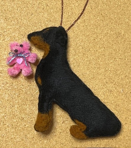 Doberman with pink teddy - doberman,